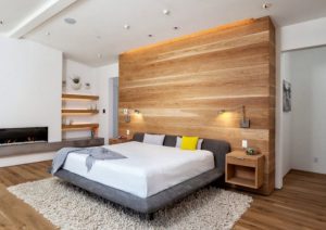 Dormitorio con paneles de madera